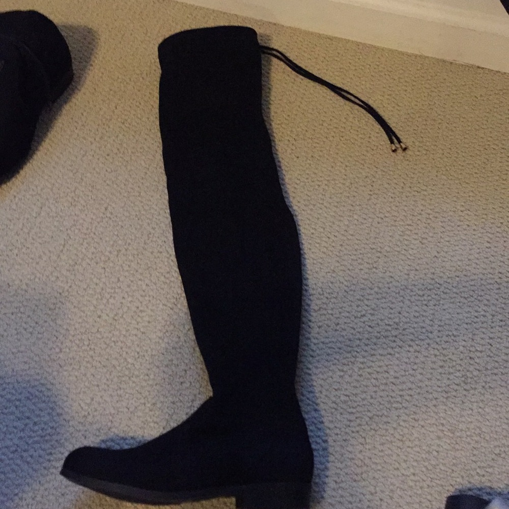 High over the knee black boots